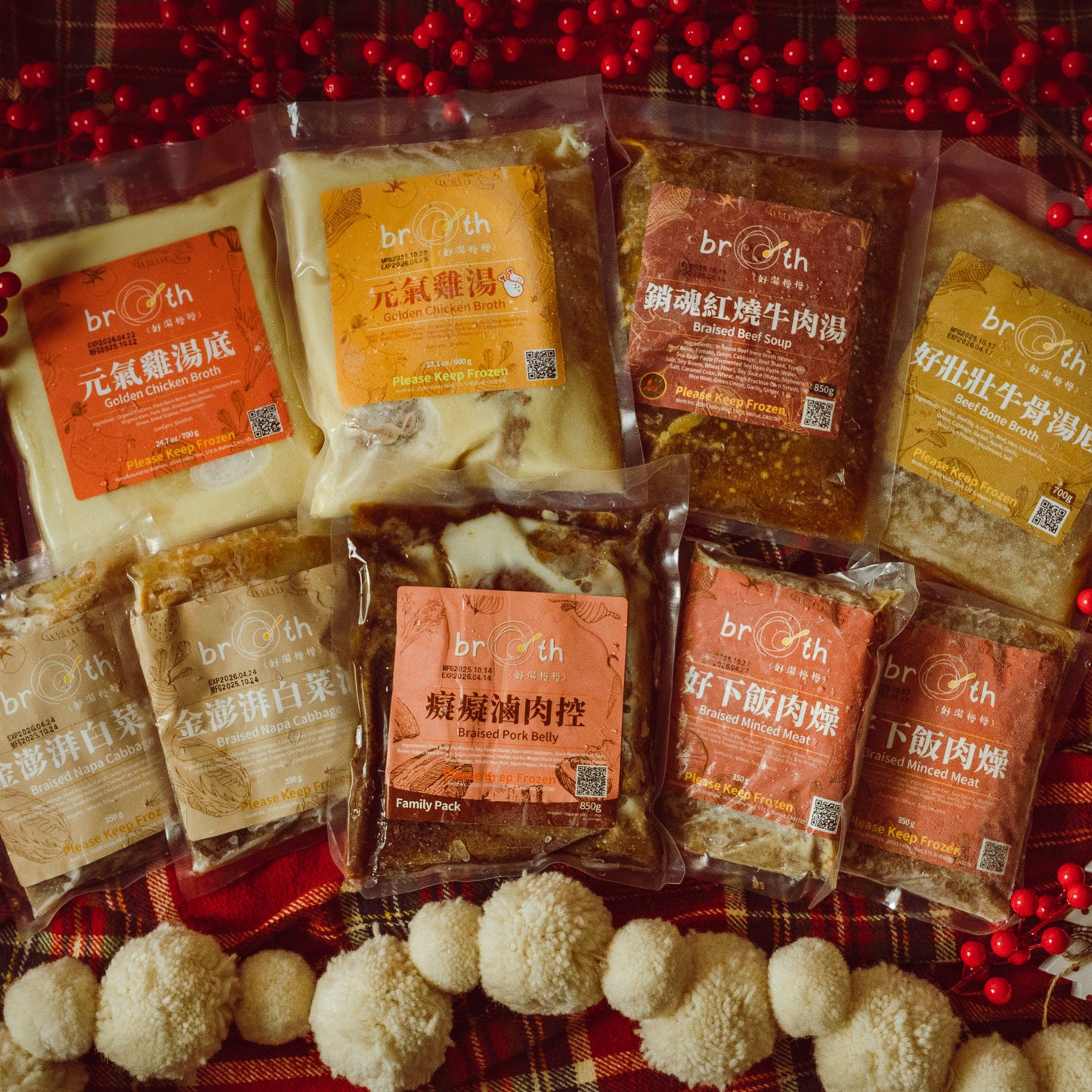 Assorted packages of beef jerky on a festive background with red berries and snowflakes.