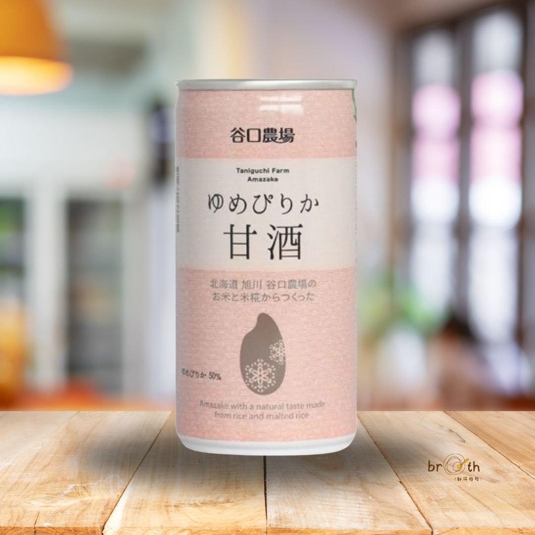 Canned Taniguchi Farm Yumepirika Amazake on a wooden table