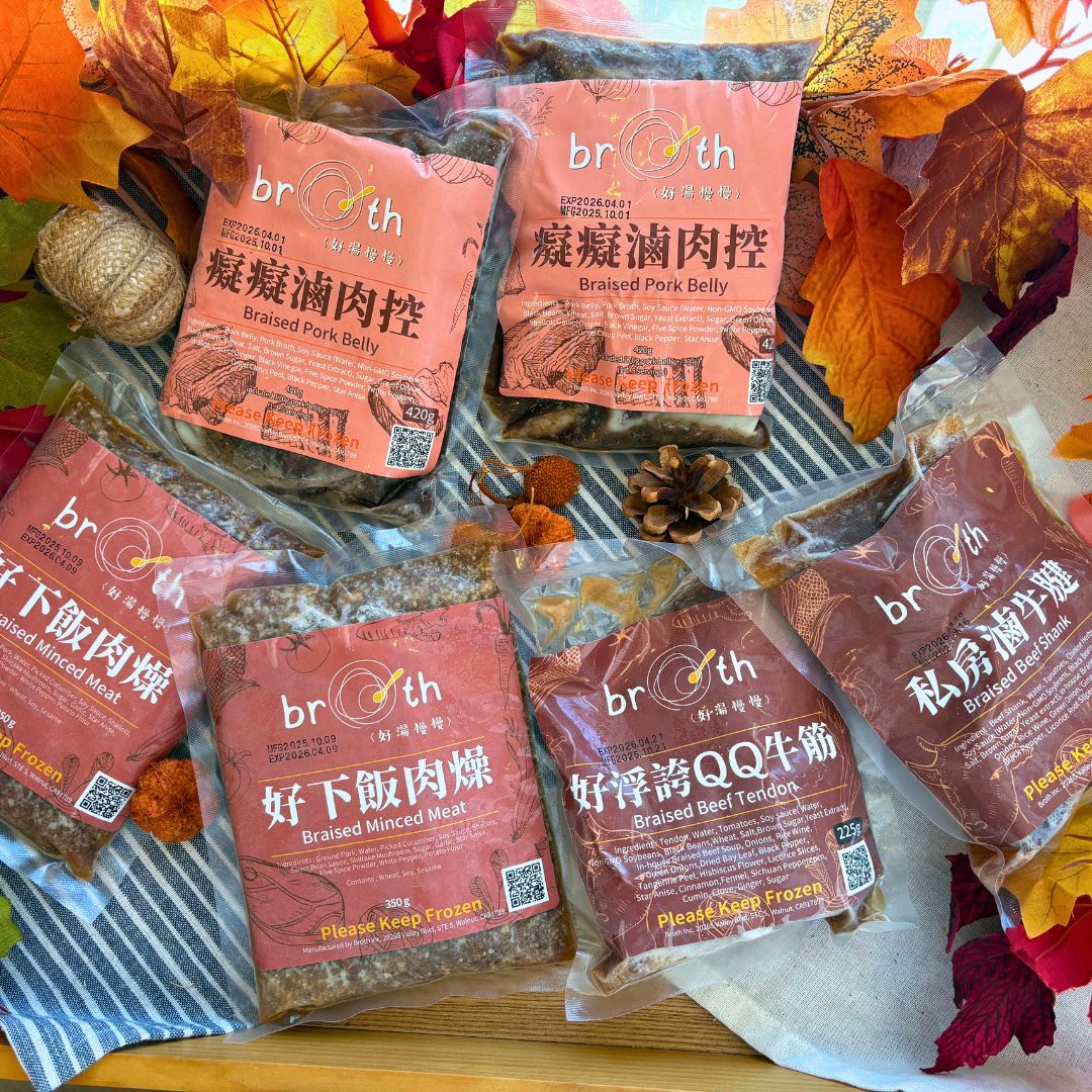 Flat lay of BROTH’s Thanksgiving Hearty Feast Set — includes Braised Pork Belly, QQ Beef Tendon, Braised Beef Shank, and Braised Minced Meat, surrounded by festive fall leaves.